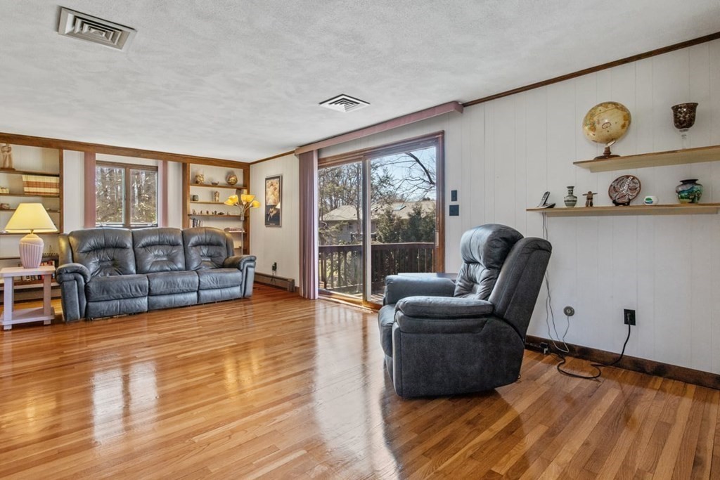 6 Dudley Road Lexington, MA 02421 - Photo 10 of 37 a living room with furniture and a large window