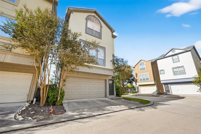a front view of a house with street