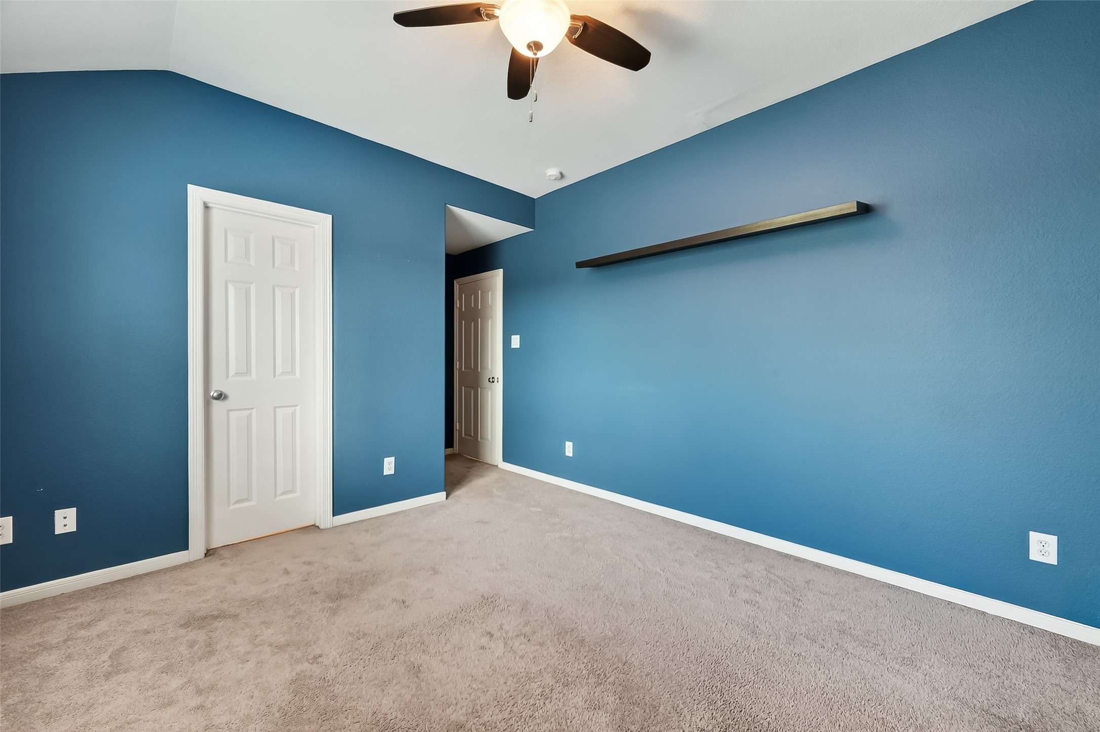 3019 Clearview Circle Houston, TX 77025 - Photo 26 of 42 a view of an empty room with a ceiling fan