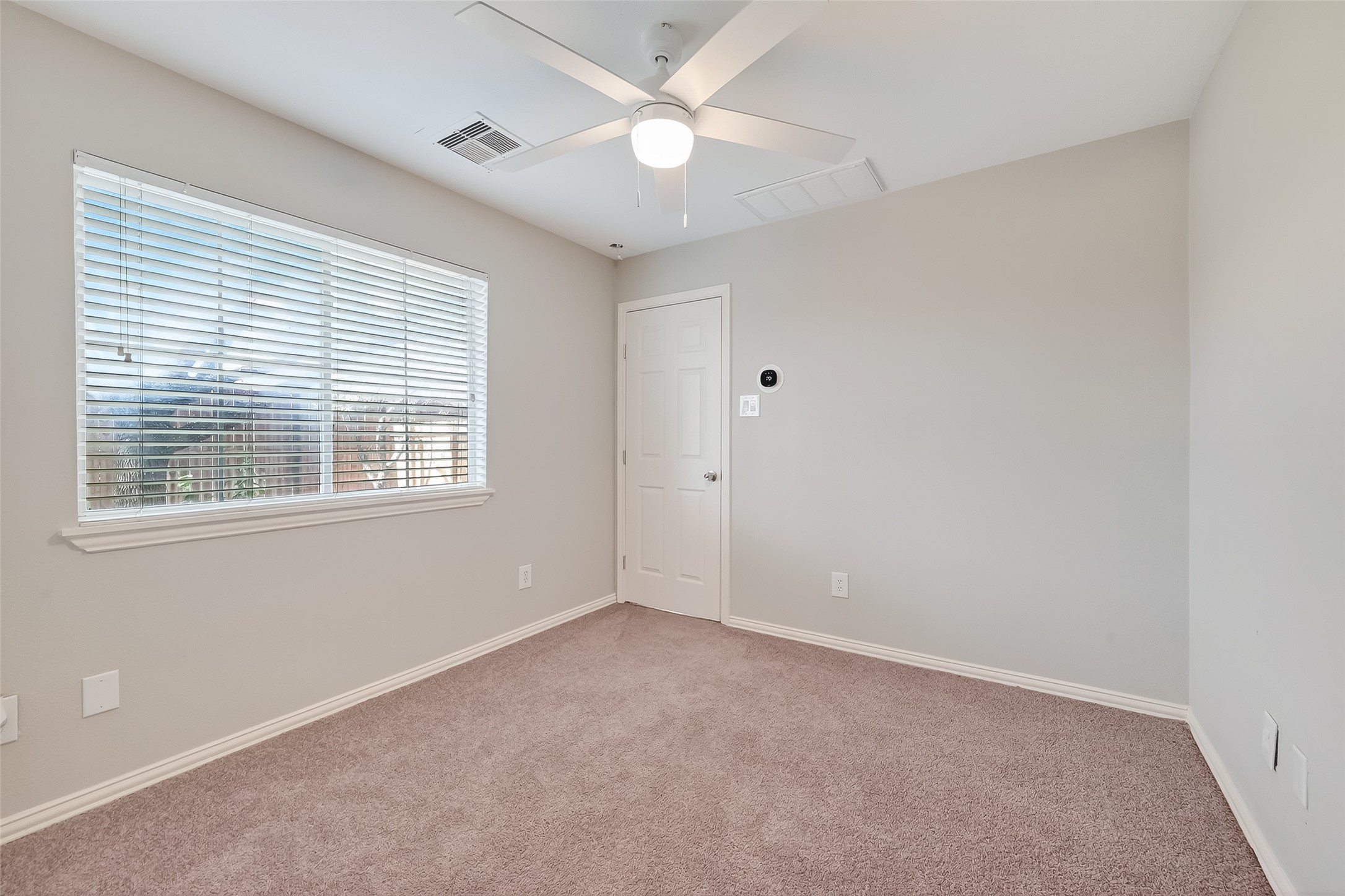 3019 Clearview Circle Houston, TX 77025 - Photo 30 of 42 a view of an empty room with a window