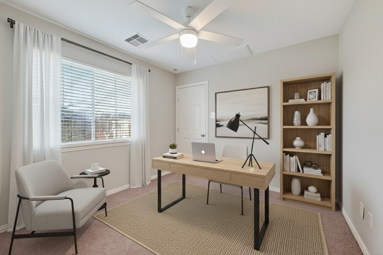 3019 Clearview Circle Houston, TX 77025 - Photo 31 of 42 a view of a workspace with furniture and a window