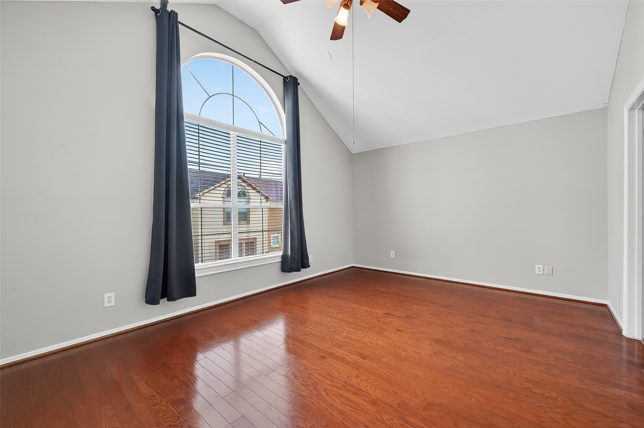 3019 Clearview Circle Houston, TX 77025 - Photo 35 of 42 an empty room with wooden floor and windows