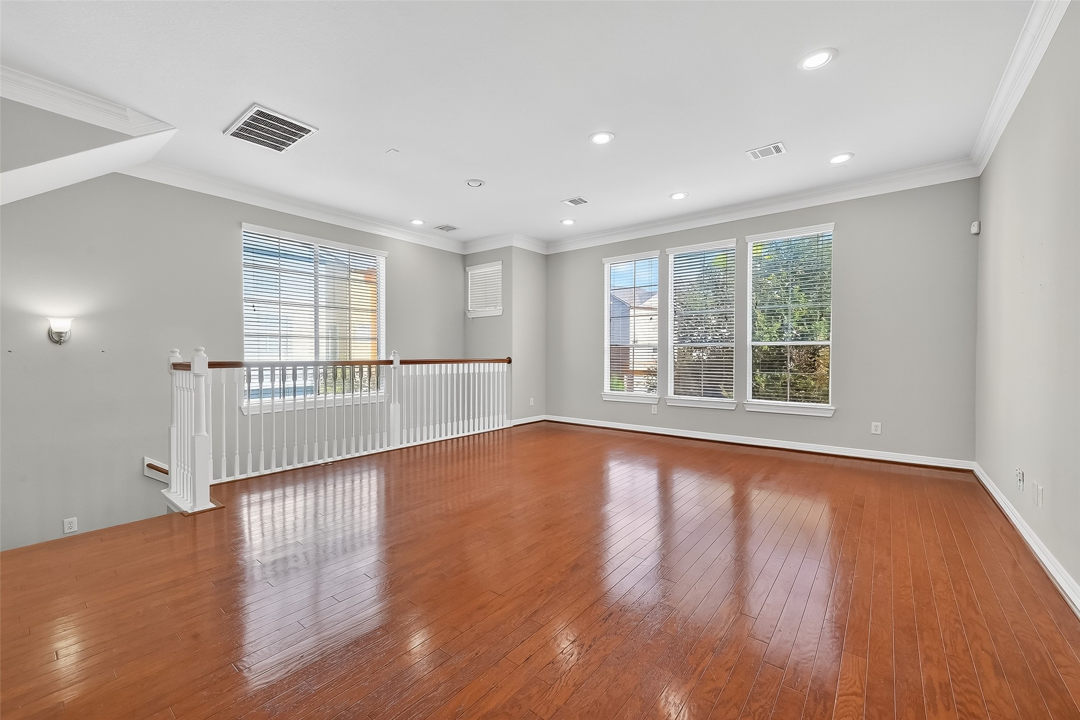 3019 Clearview Circle Houston, TX 77025 - Photo 5 of 42 a view of empty room with wooden floor and fan