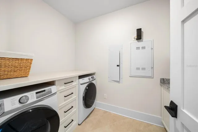 a view of a balcony with table and chairs
