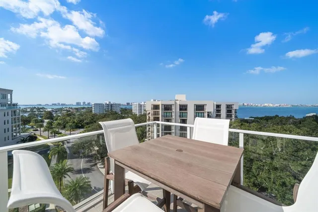 a view of a balcony with city view