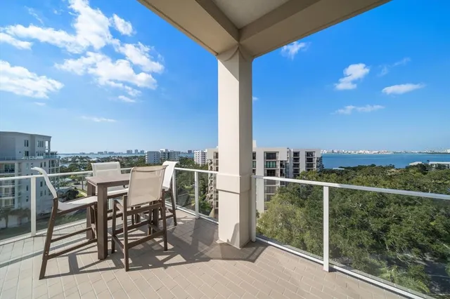 a view of a balcony with an outdoor space