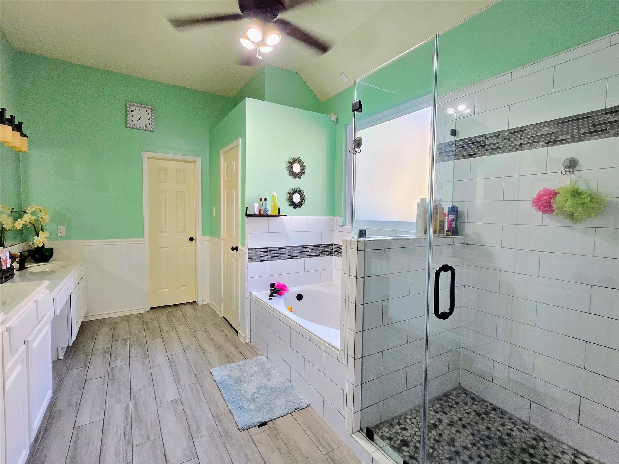 9211 Memorial Grove Drive Spring, TX 77379 - Photo 13 of 38 a bathroom with a sink and a mirror
