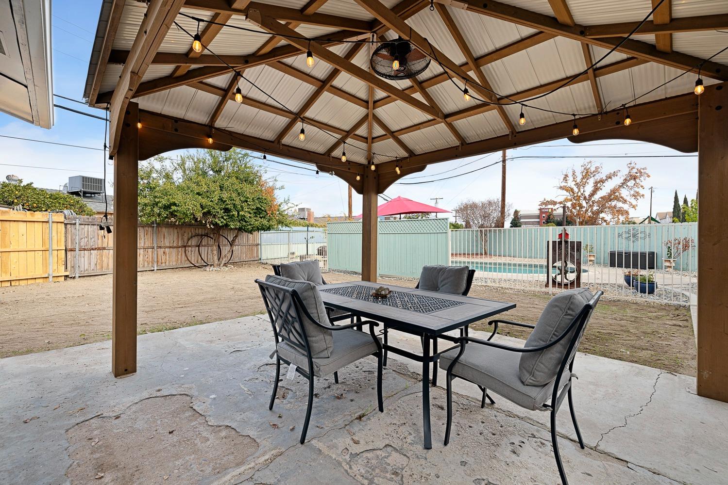 2637 Dewitt Avenue Clovis, CA 93612 - Photo 19 of 25 a view of a table and chairs in patio