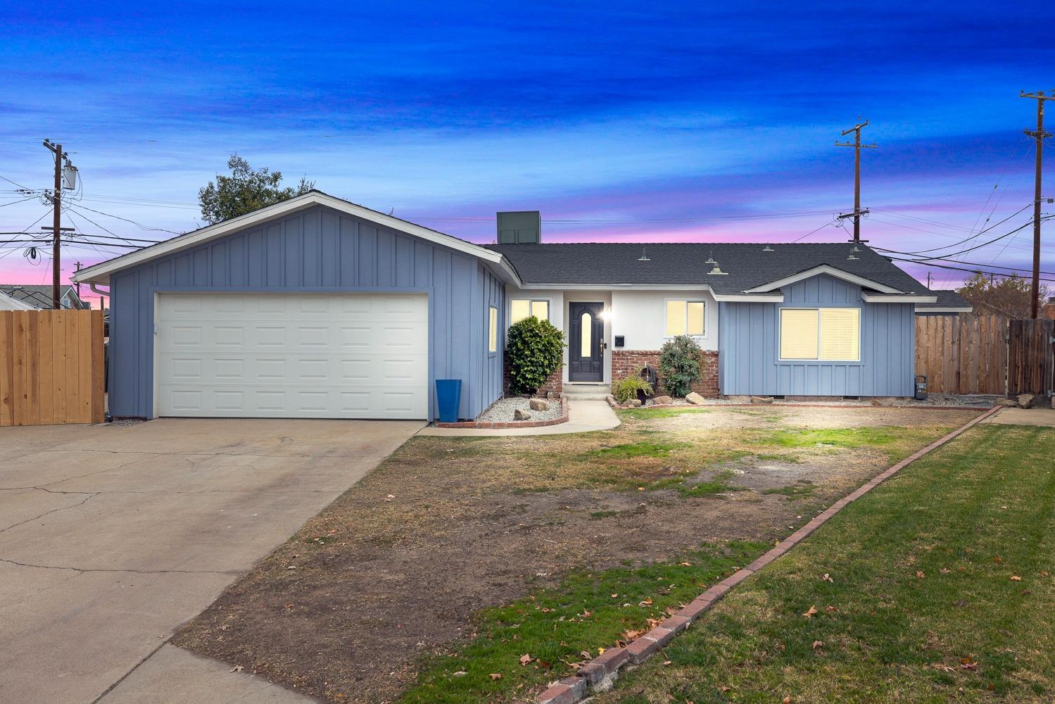 2637 Dewitt Avenue Clovis, CA 93612 - Photo 25 of 25 a view of a house with backyard and a garage