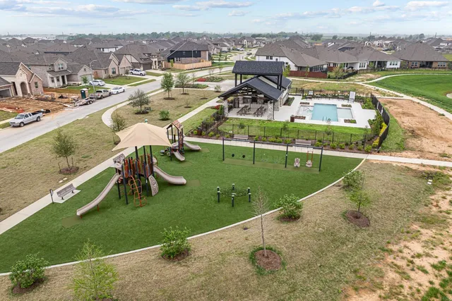 a view of a swimming pool with a terrace