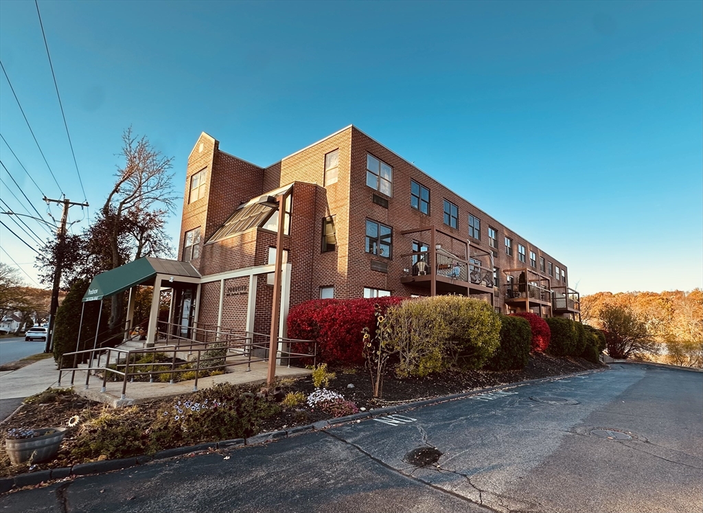 605 Eastern Avenue, Unit 211 Lynn, MA 01902 - Photo 3 of 29 a front view of a house
