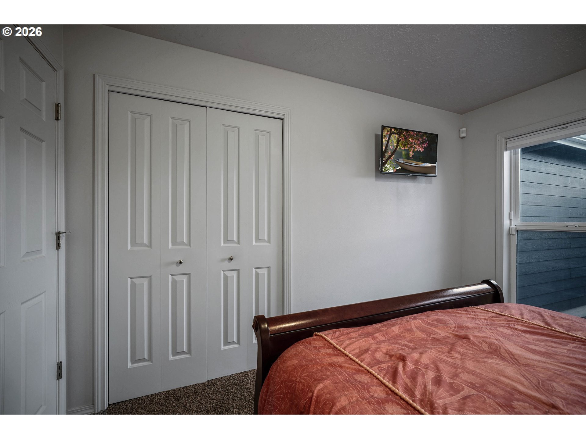 959 Stonebridge Avenue Northeast Keizer, OR 97303 - Photo 14 of 48 a bedroom with a bed and a painting on the wall