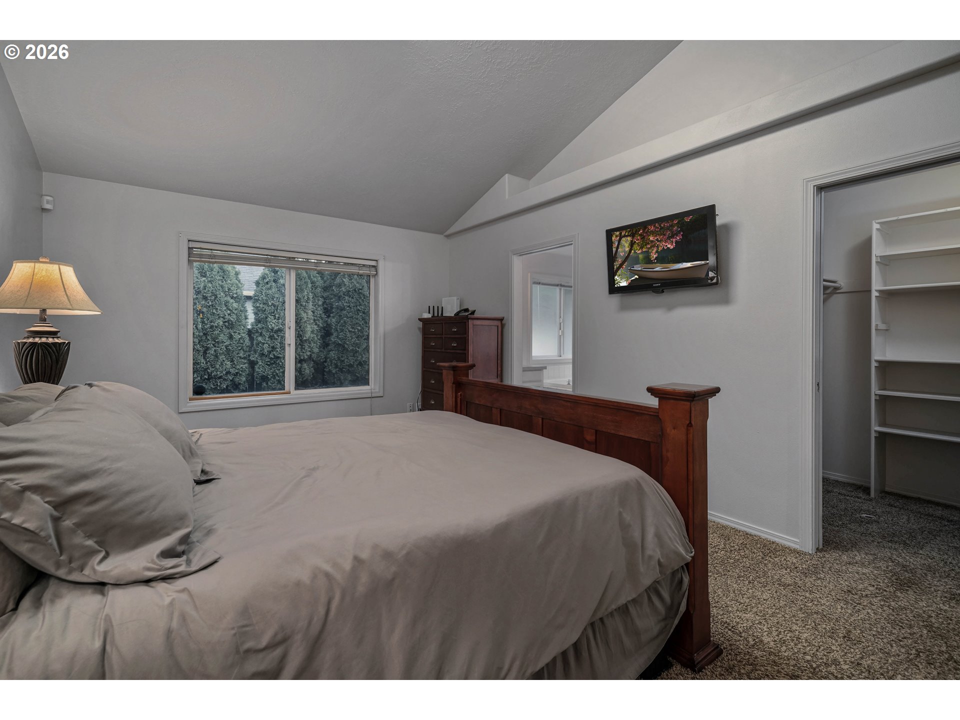 959 Stonebridge Avenue Northeast Keizer, OR 97303 - Photo 16 of 48 a bedroom with a large bed and a window