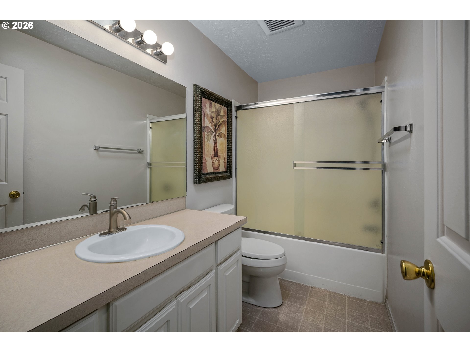 959 Stonebridge Avenue Northeast Keizer, OR 97303 - Photo 26 of 48 a bathroom with a sink toilet a mirror and shower