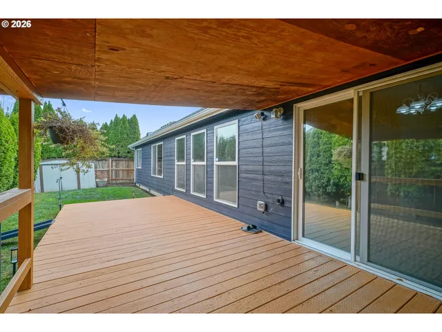 a view of a backyard with a garden