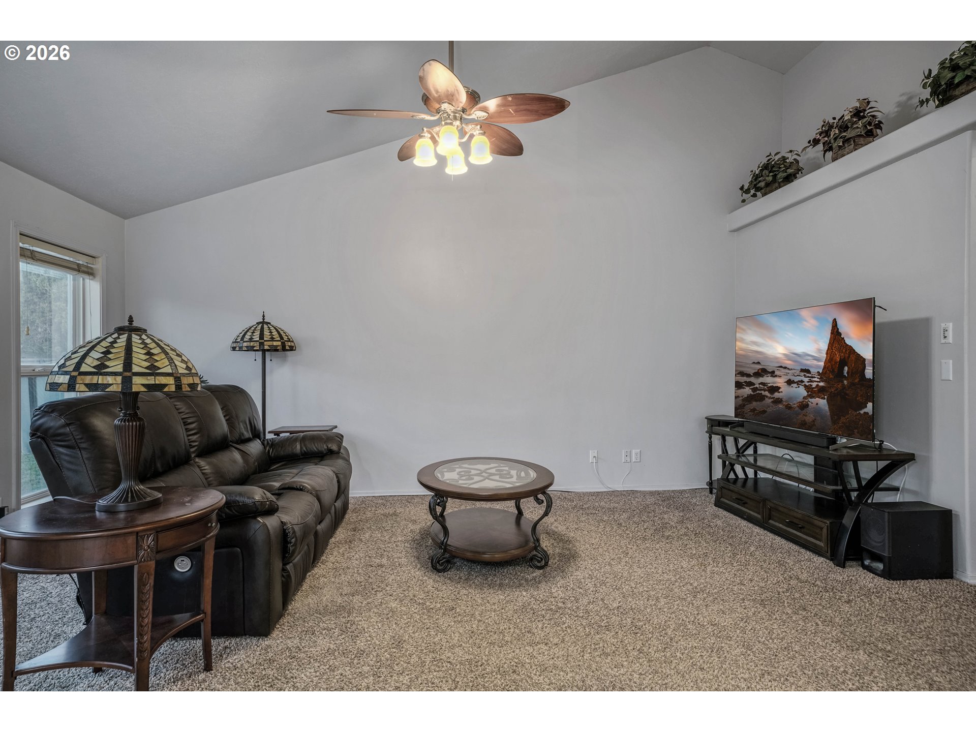 959 Stonebridge Avenue Northeast Keizer, OR 97303 - Photo 4 of 48 a living room with furniture and a flat screen tv