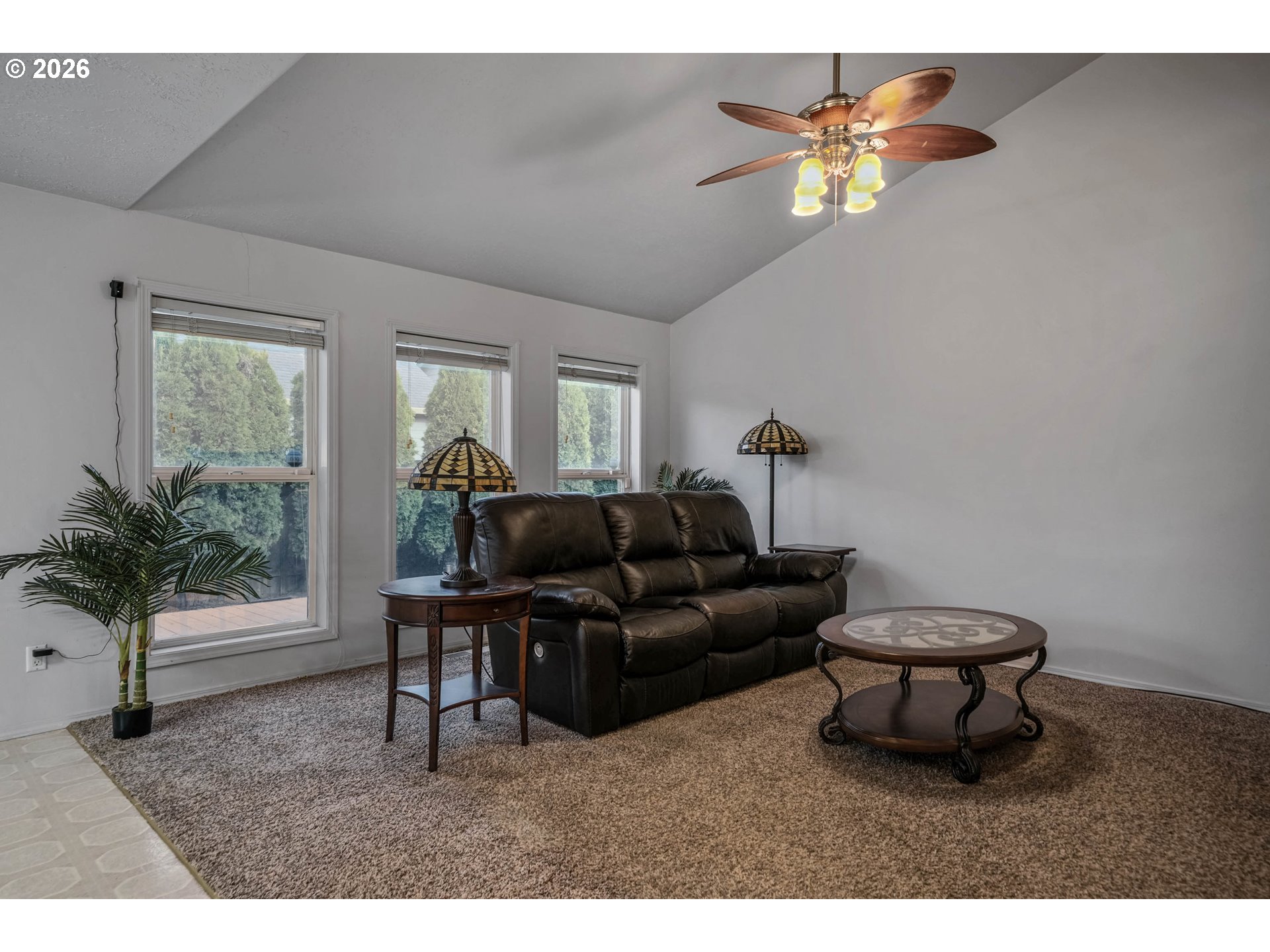 959 Stonebridge Avenue Northeast Keizer, OR 97303 - Photo 42 of 48 a living room with furniture a chandelier and a window