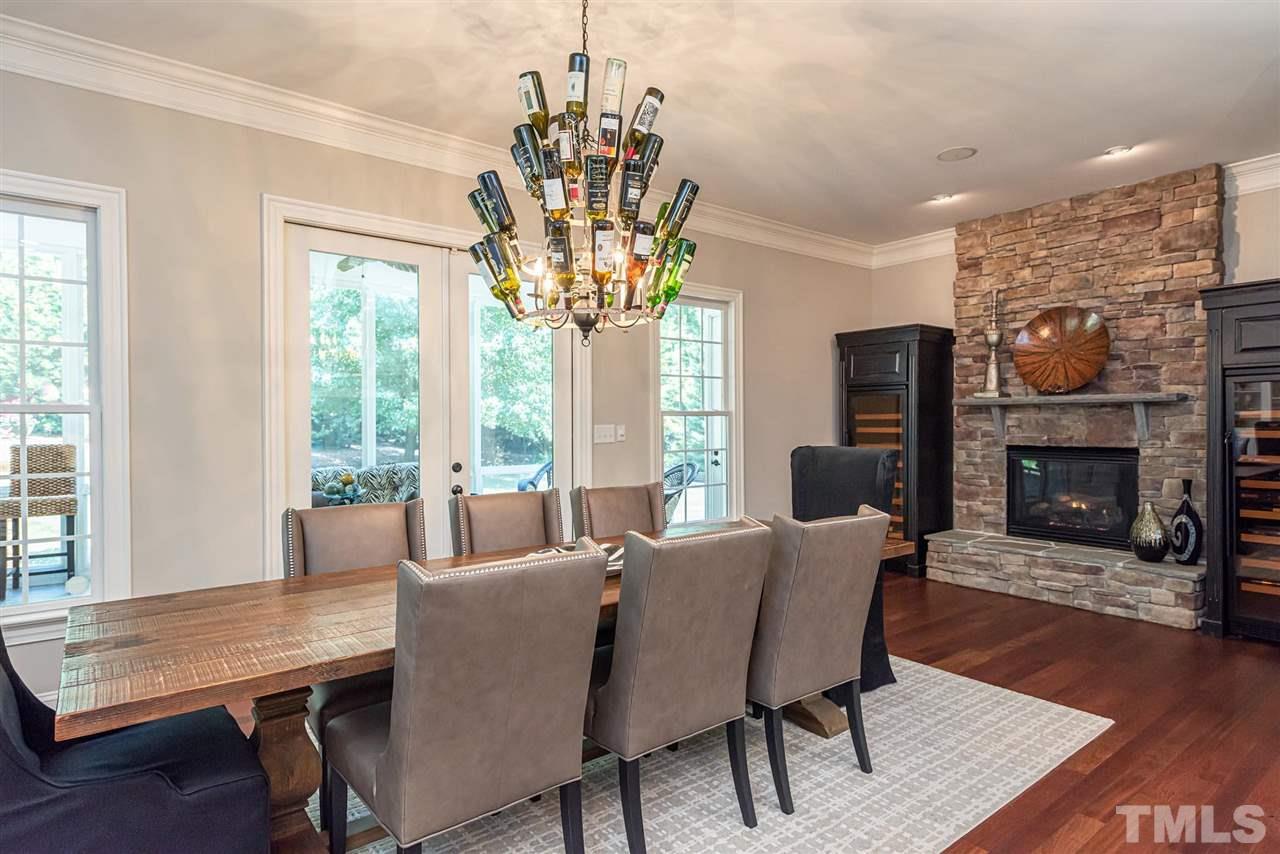 2024 Macon Ridge Road Raleigh, NC 27613 - Photo 11 of 30 9 foot table, 6 leather chairs, 2 captains chairs and rug for sale