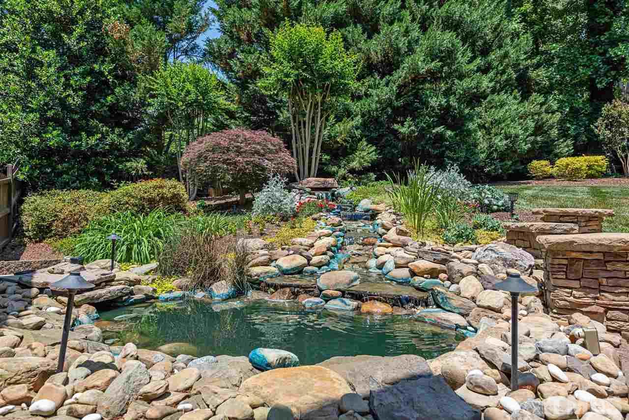 2024 Macon Ridge Road Raleigh, NC 27613 - Photo 18 of 30 Water Feature with night lighting and Sonos speakers. Hot Tub with cool lights and sound conveys!