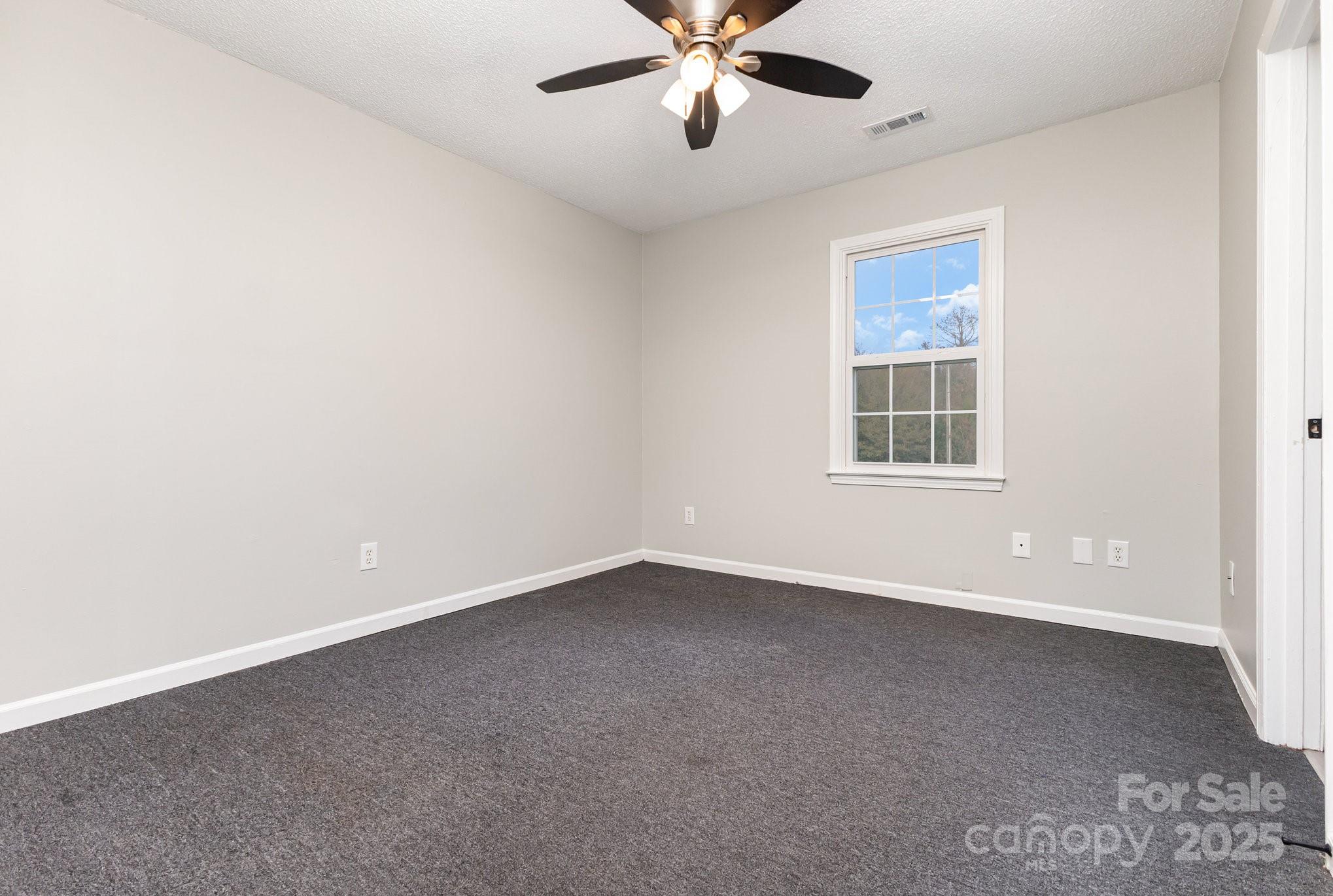 132 Hicks Road Grover, NC 28073 - Photo 22 of 31 a view of an empty room with a window