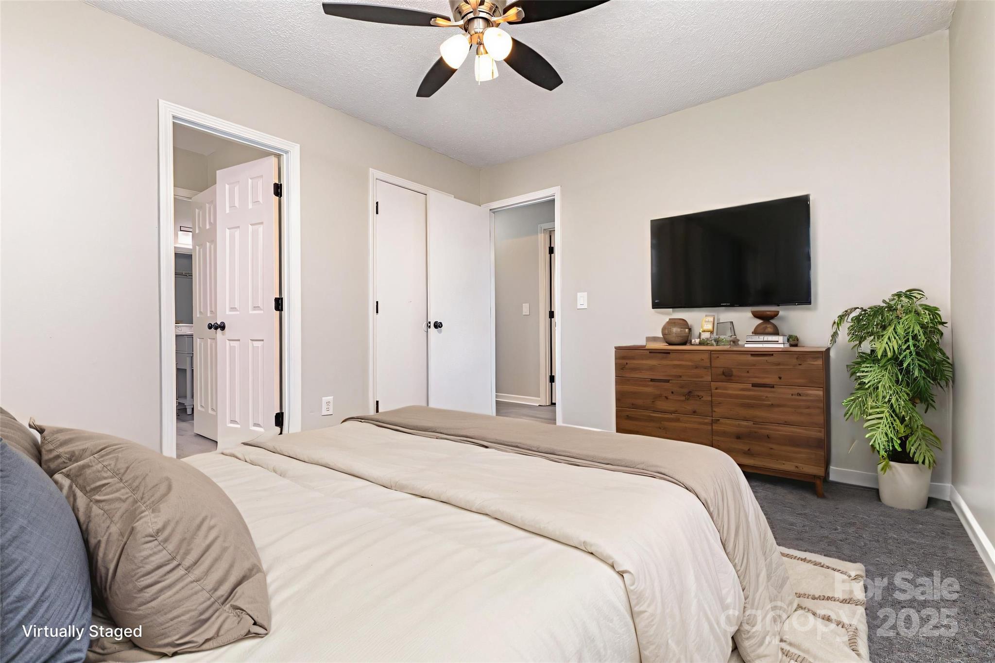 132 Hicks Road Grover, NC 28073 - Photo 23 of 31 a bedroom with a bed and a flat screen tv