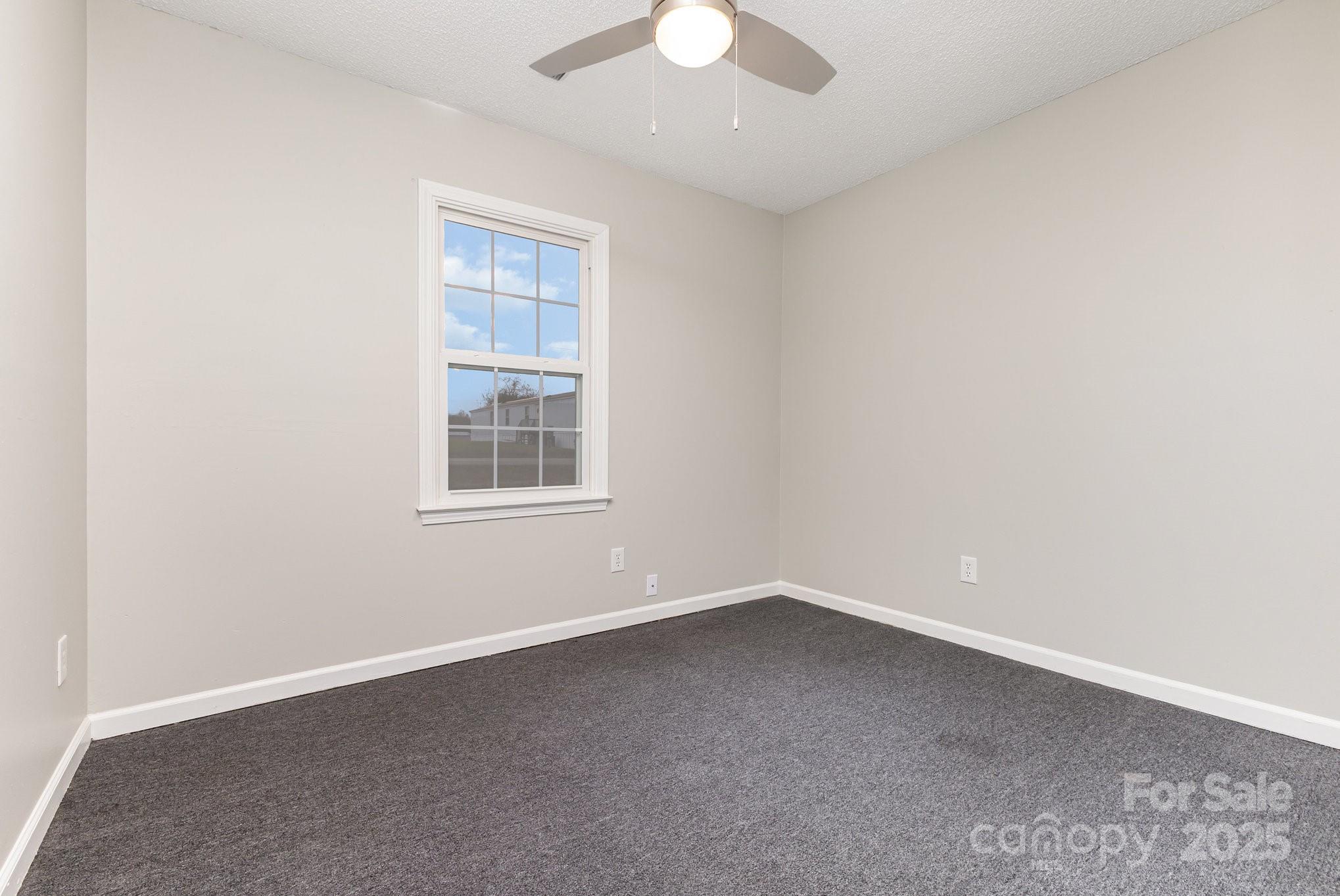 132 Hicks Road Grover, NC 28073 - Photo 27 of 31 an empty room with a window