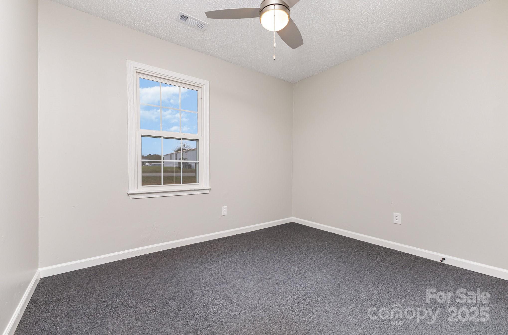 132 Hicks Road Grover, NC 28073 - Photo 28 of 31 an empty room with a window