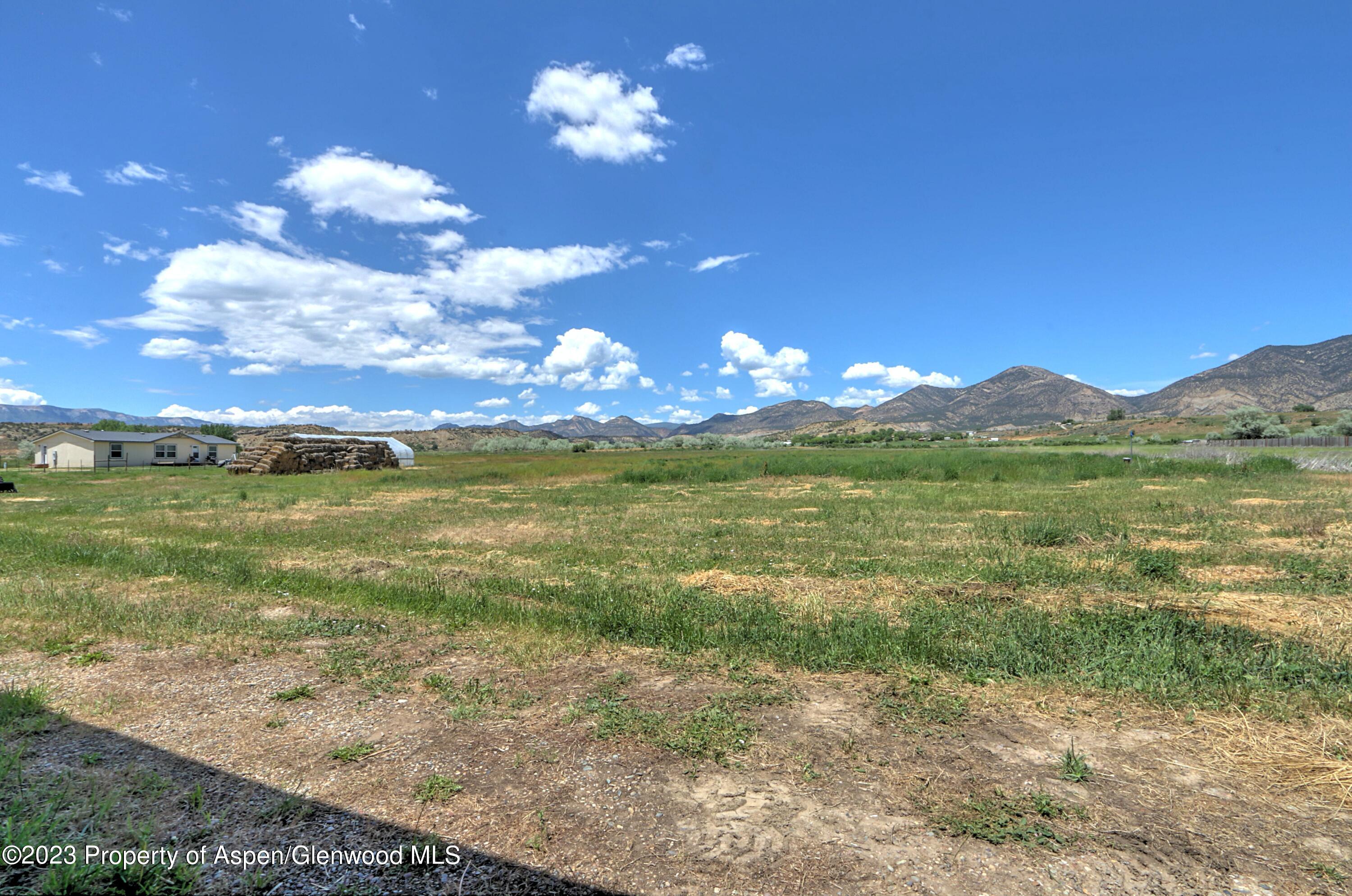 2517 210 County Road Rifle, CO 81650 - Photo 30 of 41 a view of a lake with a mountain