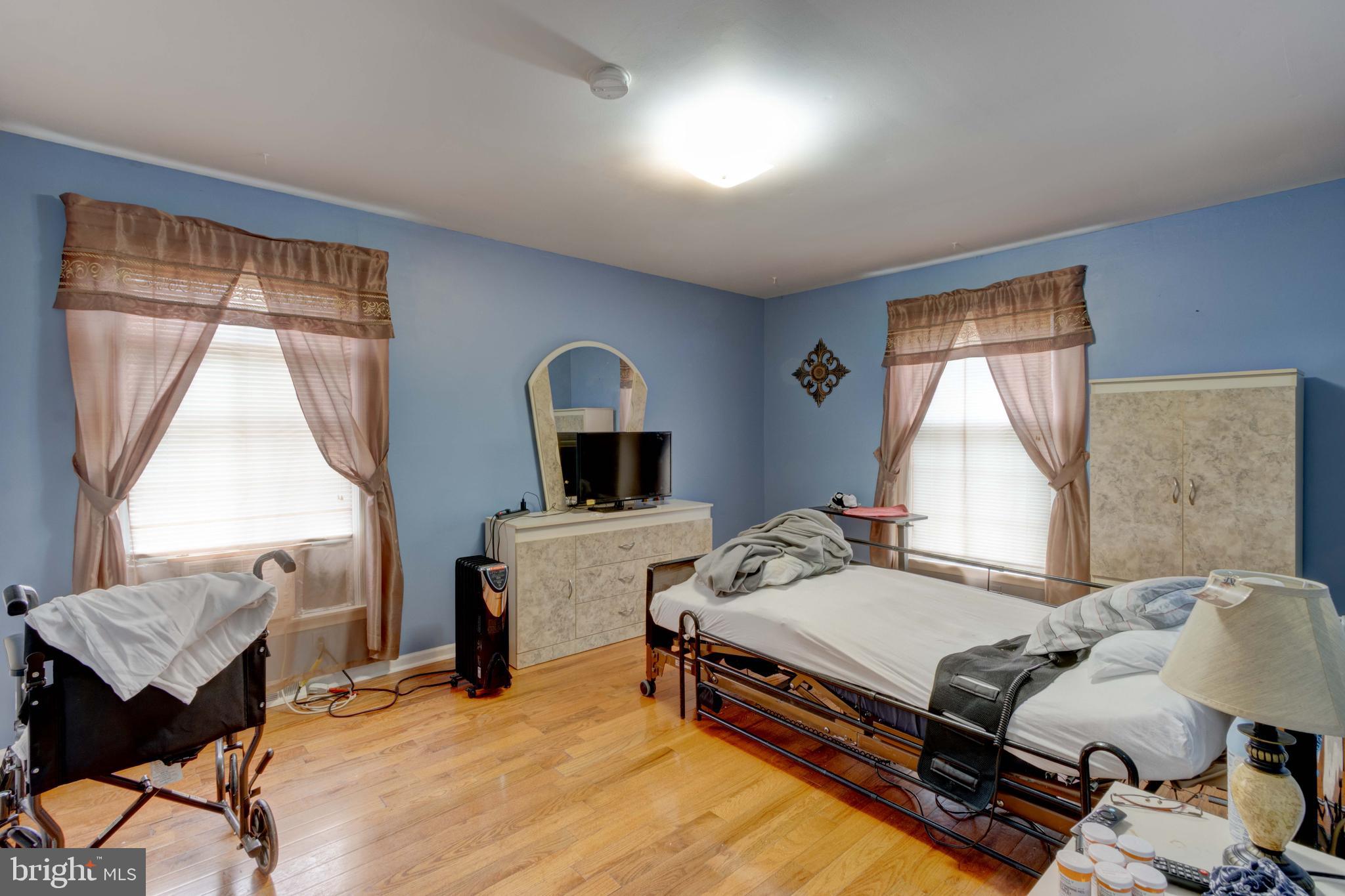 205 Glenville Road Churchville, MD 21028 - Photo 15 of 25 a bedroom with a bed and a table