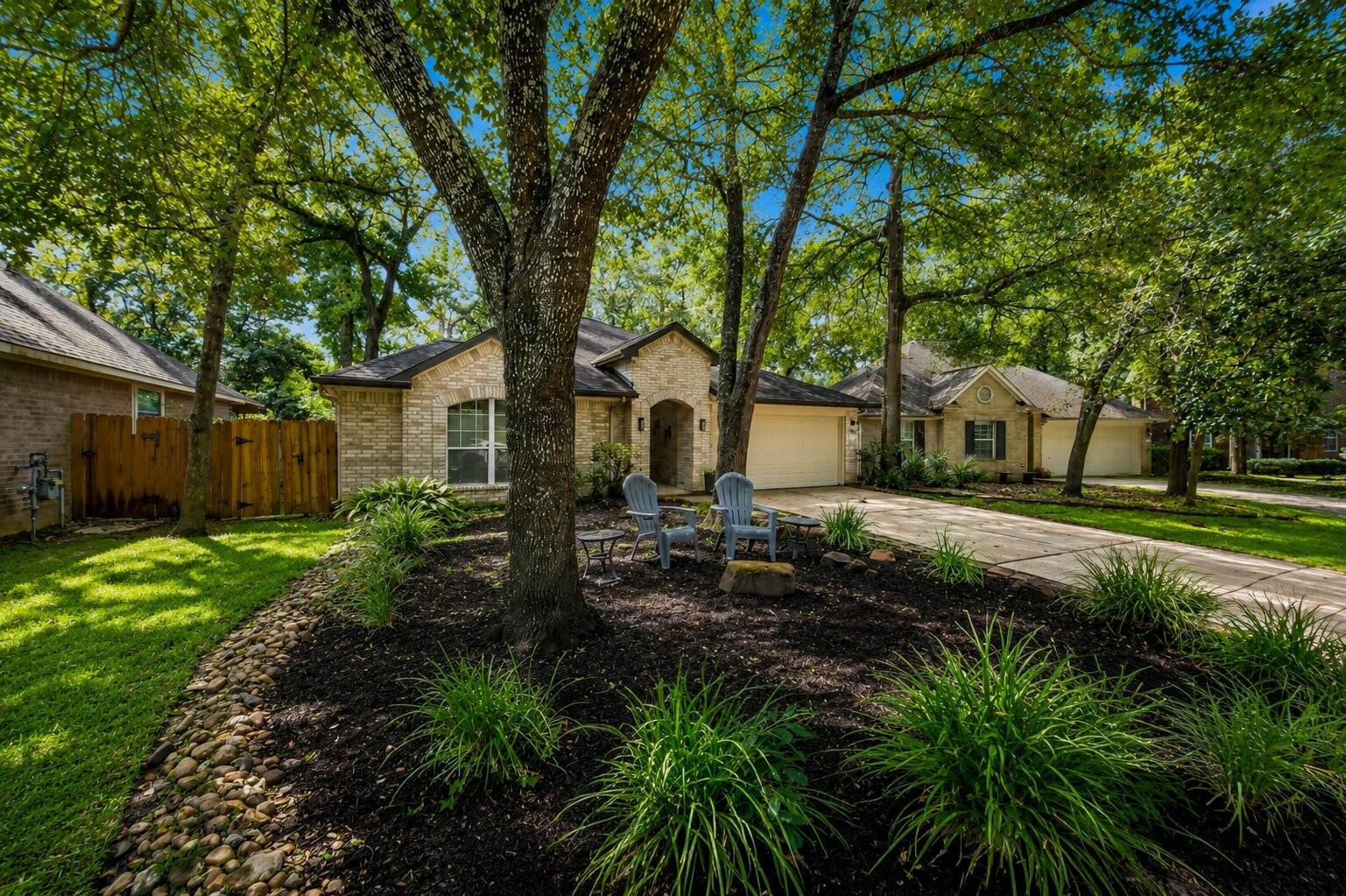 39 Steep Trail Place Conroe, TX 77385 - Photo 2 of 23 Large landscaped lot with extended driveway