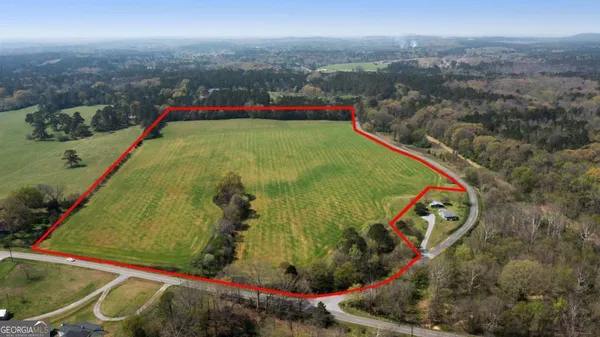 an aerial view of a pool