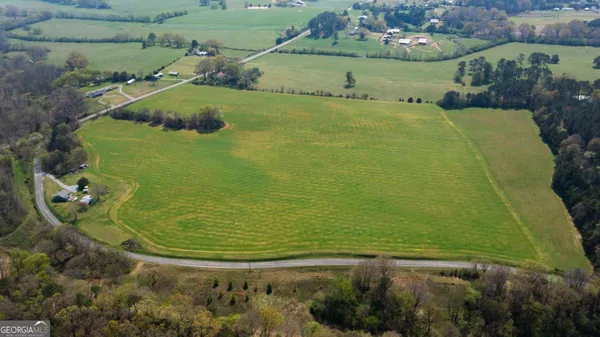 a view of a golf course with a lake