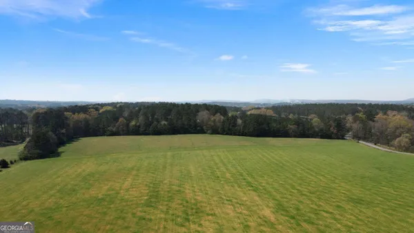 a view of an outdoor space and swimming pool