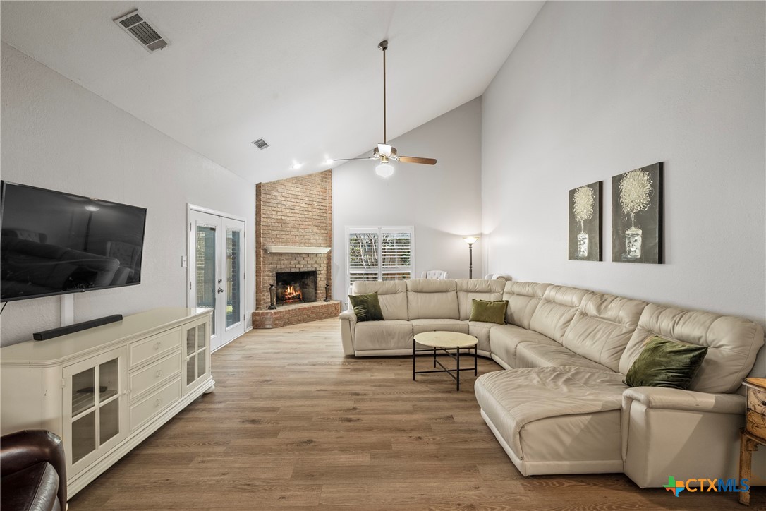 4518 Stagecoach Trail Temple, TX 76502 - Photo 12 of 29 a living room with furniture and a flat screen tv