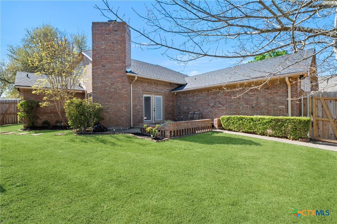 4518 Stagecoach Trail Temple, TX 76502 - Photo 26 of 29 a view of a back yard of the house