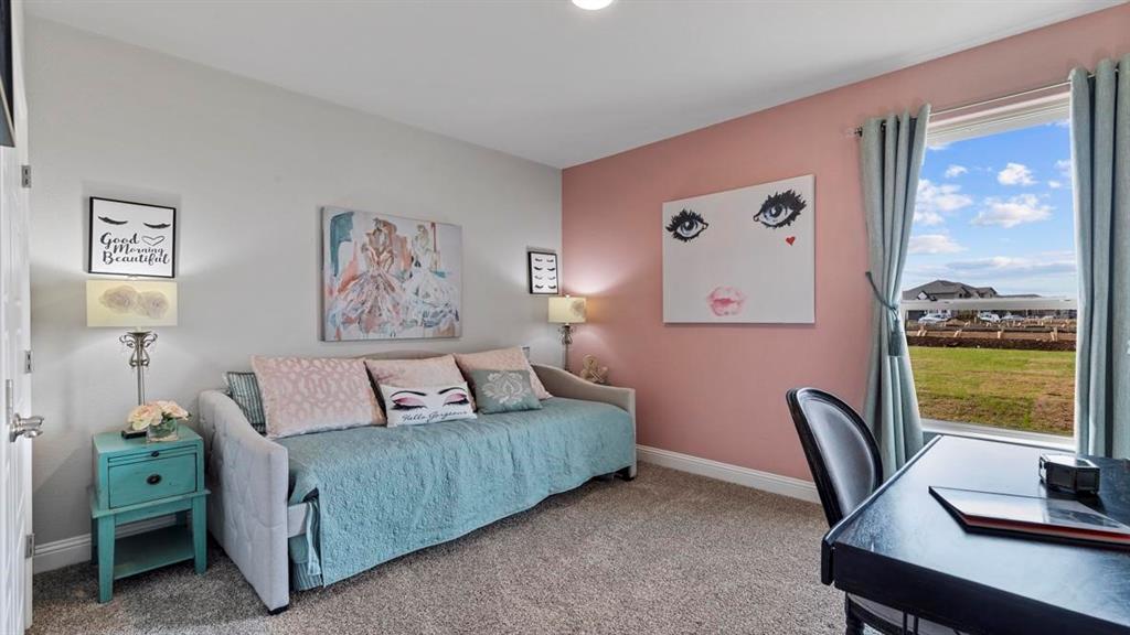 11205 Treehouse Trail Justin, TX 76247 - Photo 26 of 39 a living room with furniture and a window