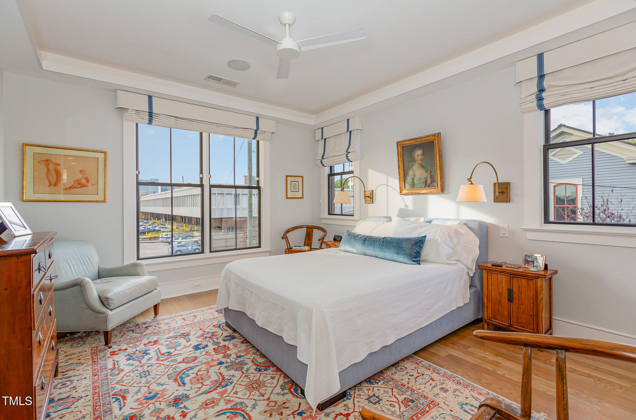 117 South Bloodworth Street Raleigh, NC 27601 - Photo 22 of 36 a bedroom with a large bed and a window