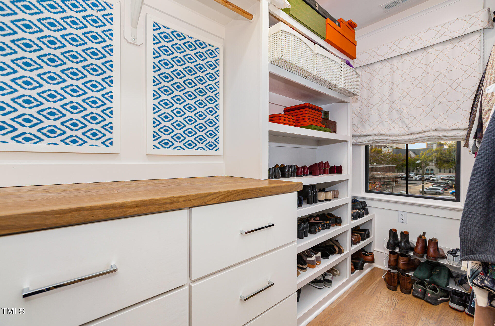 117 South Bloodworth Street Raleigh, NC 27601 - Photo 23 of 36 a kitchen with stainless steel appliances cabinets and a large window