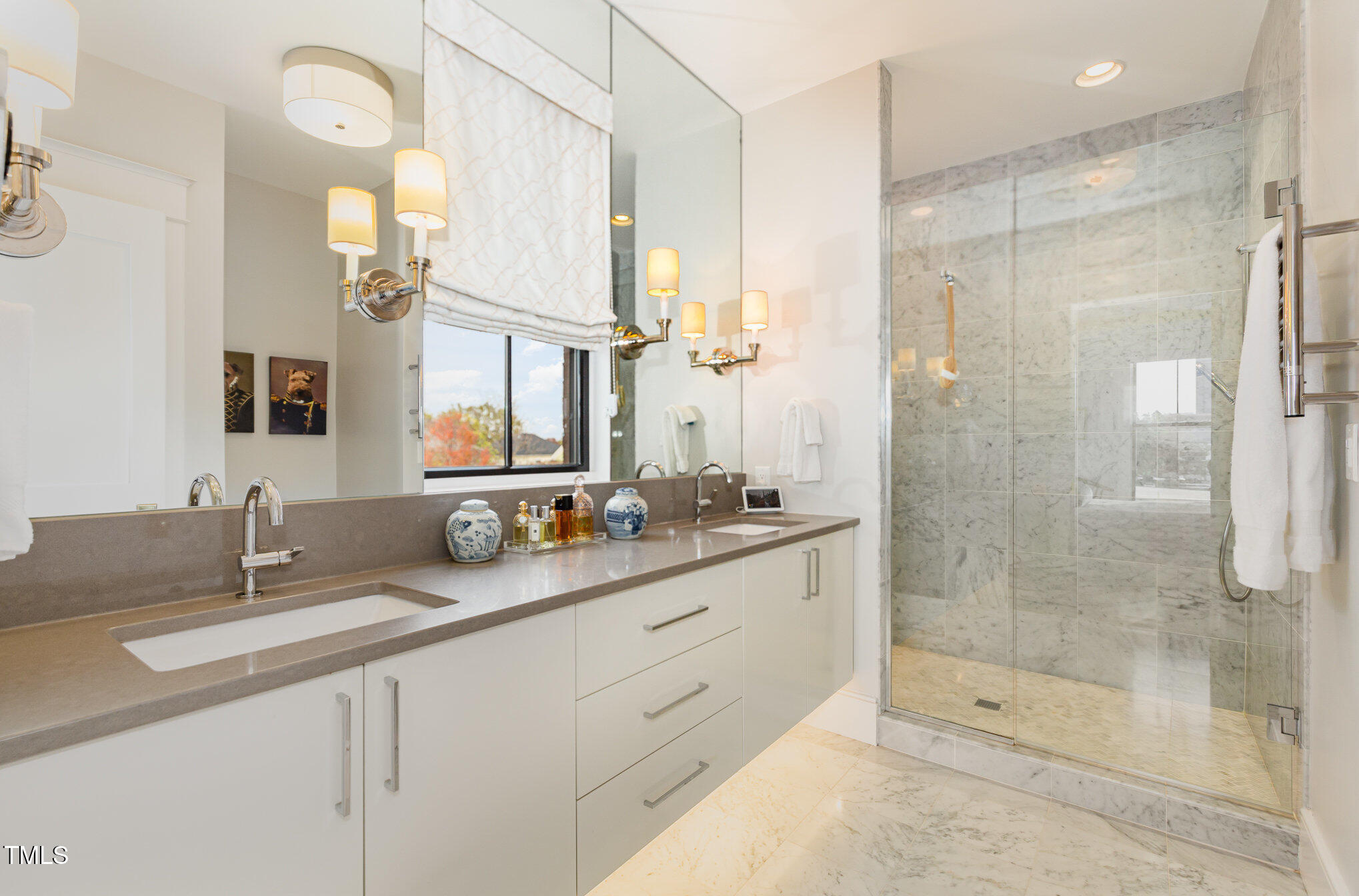 117 South Bloodworth Street Raleigh, NC 27601 - Photo 24 of 36 a bathroom with double sink and a mirror