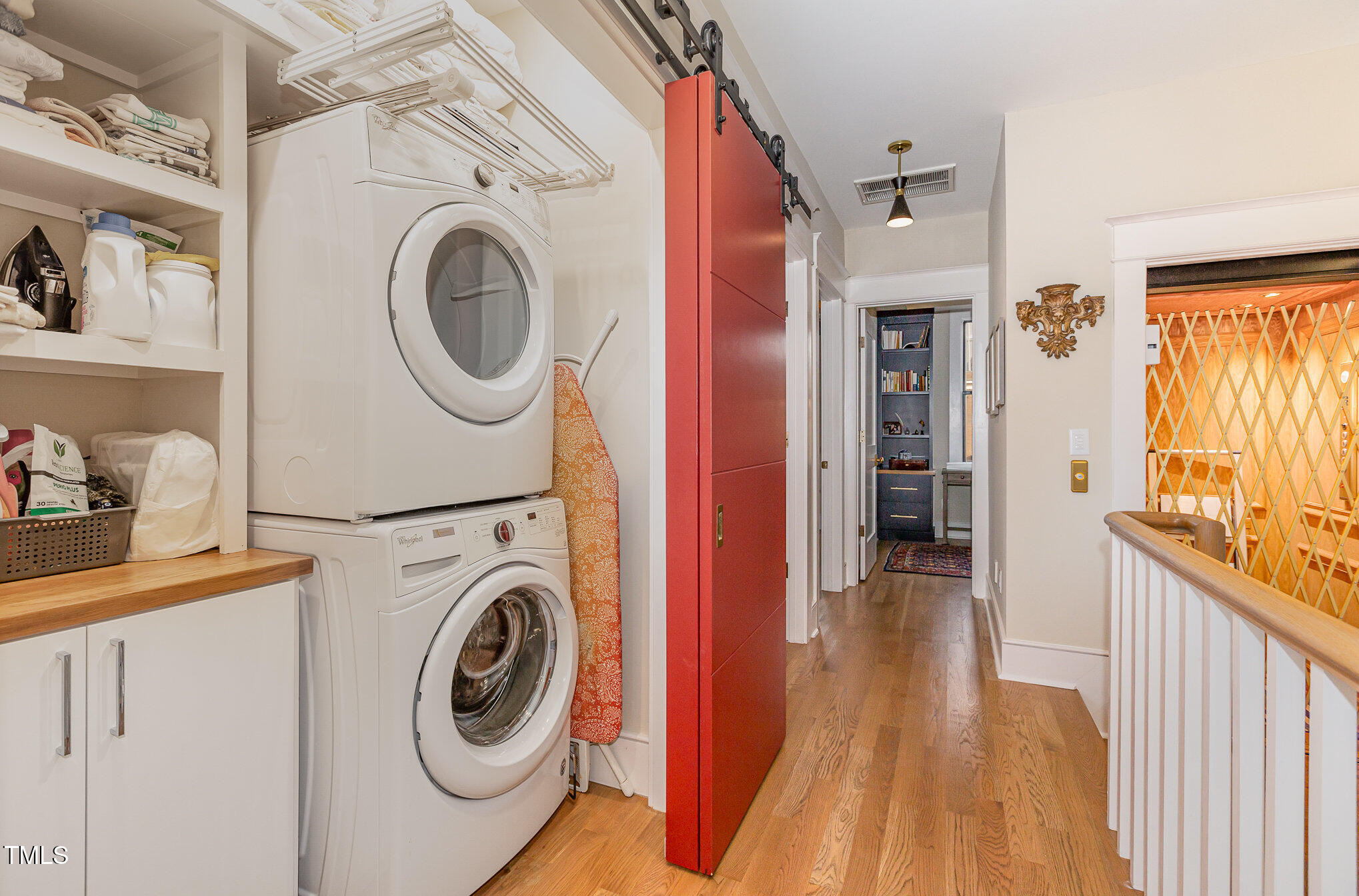 117 South Bloodworth Street Raleigh, NC 27601 - Photo 27 of 36 a view of a hallway with washer and dryer