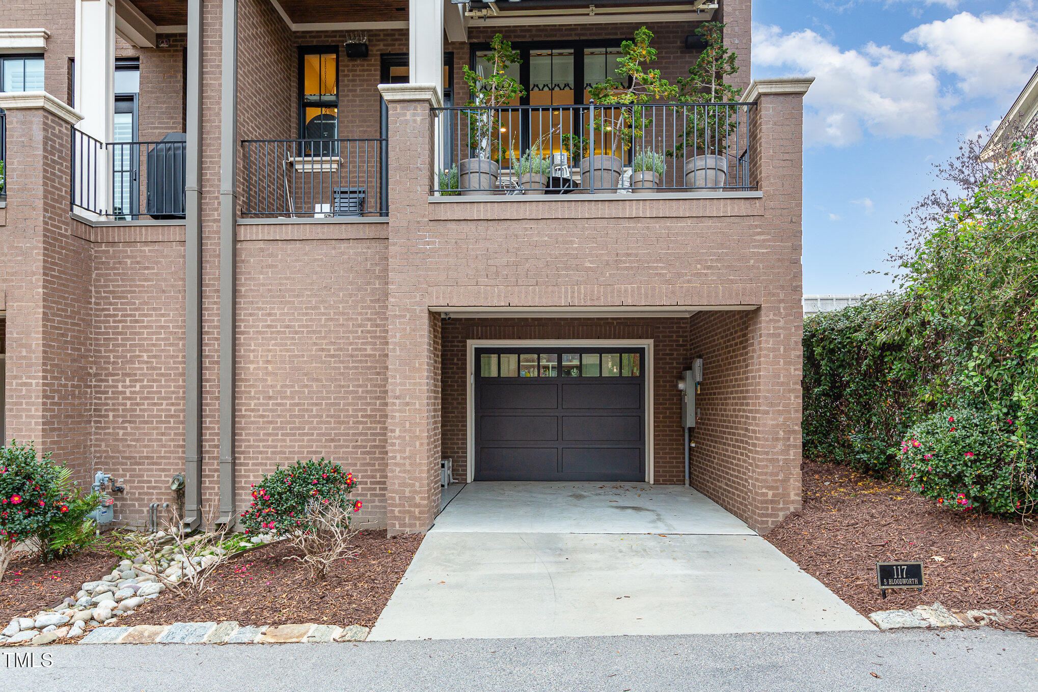 117 South Bloodworth Street Raleigh, NC 27601 - Photo 30 of 36 a front view of a house with a garden