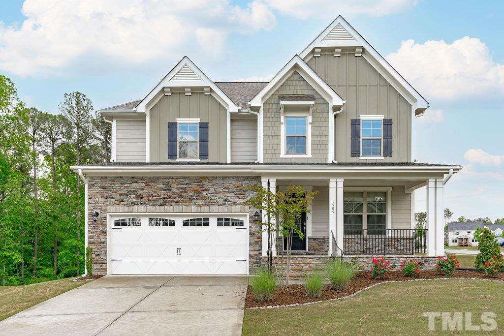 Beautifull home with stone accent and covered front porch welcomes home!