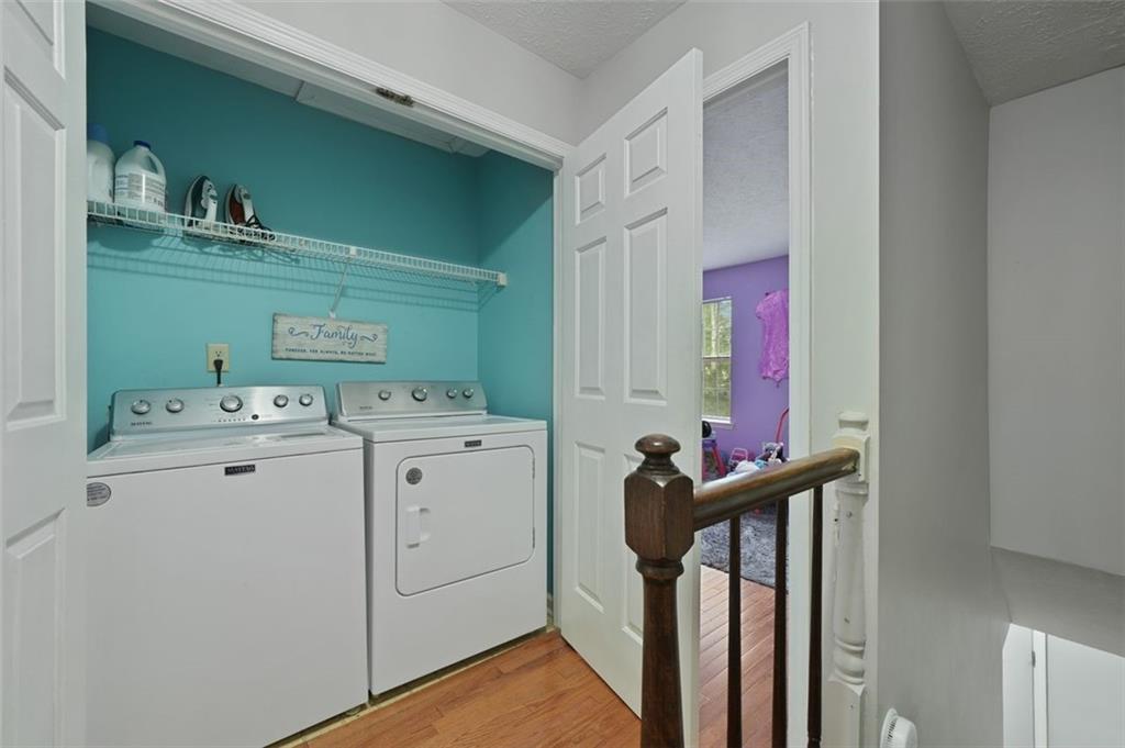 6420 Marbut Road Lithonia, GA 30058 - Photo 22 of 29 a utility room with dryer and washer