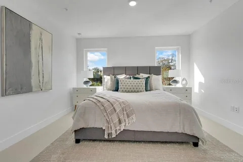 a view of a street with cars