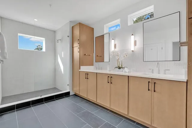 a view of a street with cars