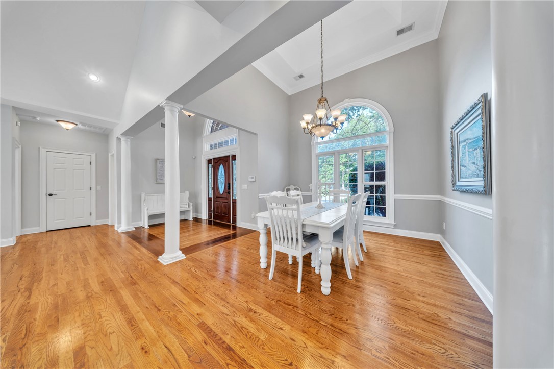 102 Country Walk Lane Clemson, SC 29631 - Photo 12 of 39 A grand entry with soaring vaulted ceilings and gleaming hardwood floors welcomes you into this elegant home.