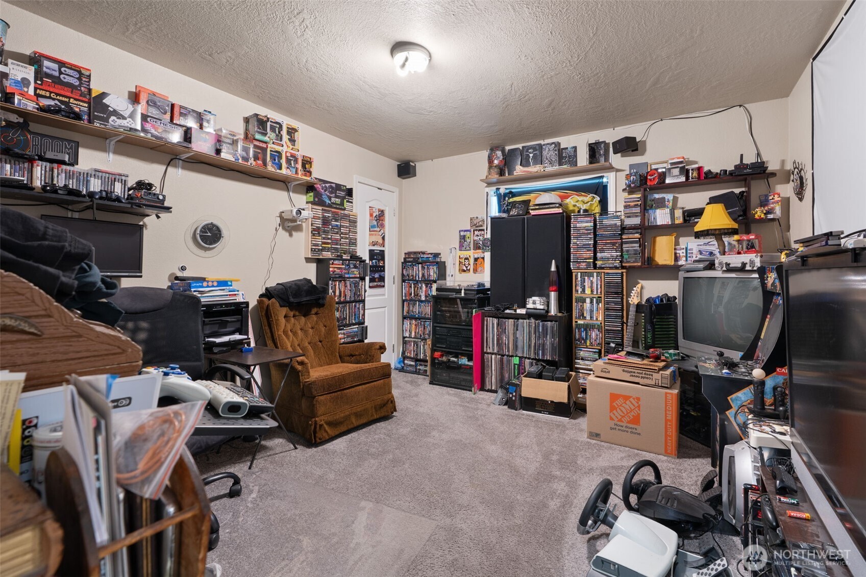 608 Main Street Vader, WA 98593 - Photo 6 of 37 a view of a workspace with furniture and toys