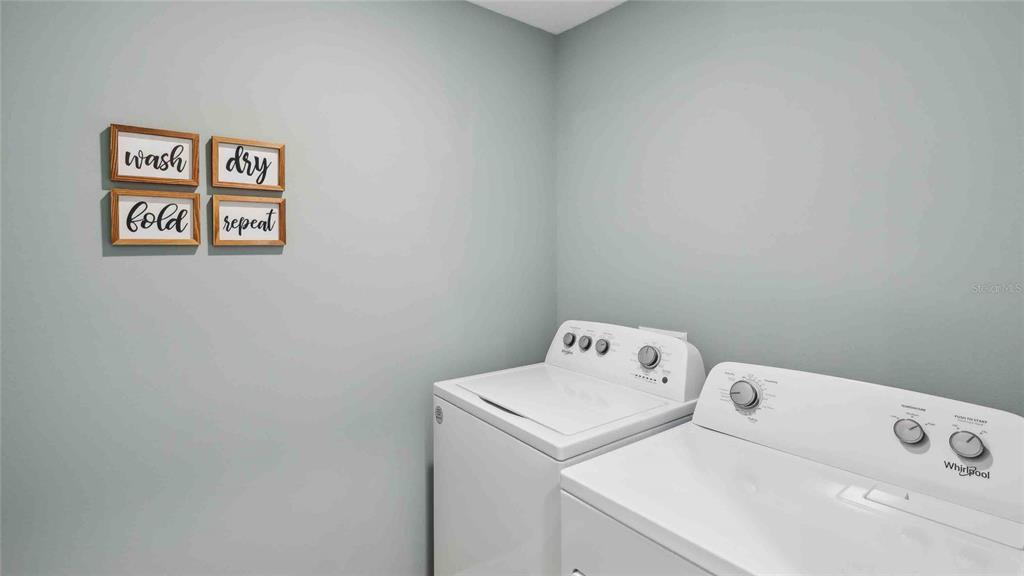 24478 Northwest 10th Road Newberry, FL 32669 - Photo 18 of 24 a utility room with dryer and washer