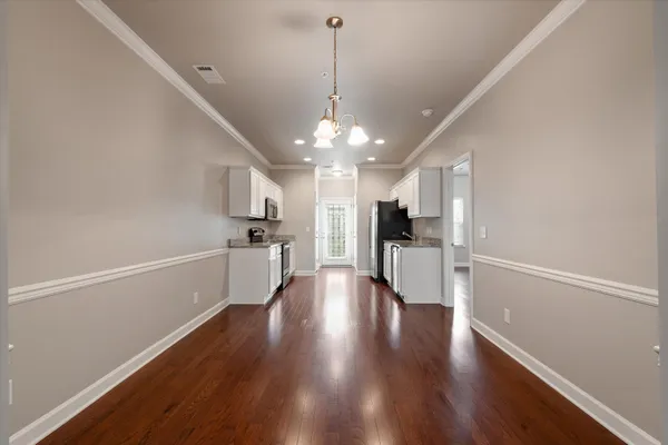 a bathroom with a shower and a sink