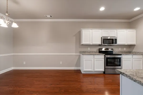an aerial view of a house with a garden